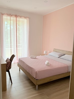 2 dormitorios, tabla de planchar con plancha, wifi gratis y ropa de cama
