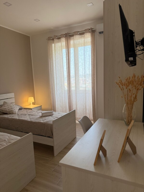 2 slaapkamers, een strijkplank/strijkijzer, gratis wifi, beddengoed