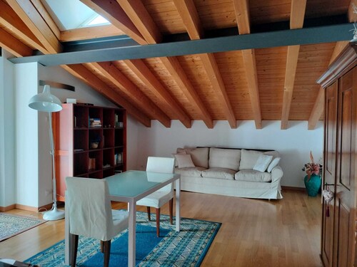 Room in attic penthouse with terrace
