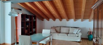 Room in attic penthouse with terrace