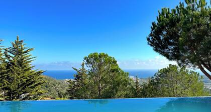 Architect-designed home with exceptional panoramic ocean views and an infinity pool