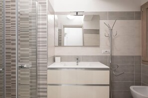 Shower, free toiletries, hair dryer, towels