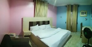 Deluxe Room, Balcony, City View | Desk, laptop workspace, blackout curtains, soundproofing