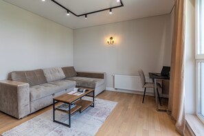 40-inch LCD TV with cable channels - Stylish apartment with a river view (Minsk)