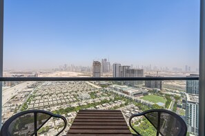 Departamento exclusivo, balcón, vista a la ciudad | Balcón