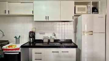 Apartment | Private kitchen | Fridge, microwave, oven, stovetop