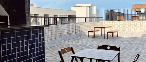 Apartamento | Restaurante al aire libre