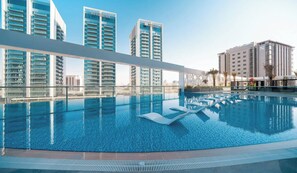 Outdoor pool, pool umbrellas, pool loungers