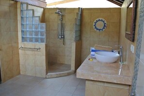 Shower, hair dryer, towels, soap