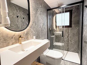 Shower, free toiletries, hair dryer, towels