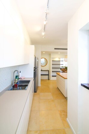 Fridge, microwave, stovetop, cookware/dishes/utensils - Mishmar Haam I - Two Bedroom Apartment, Sleeps 4 (Jerusalem)