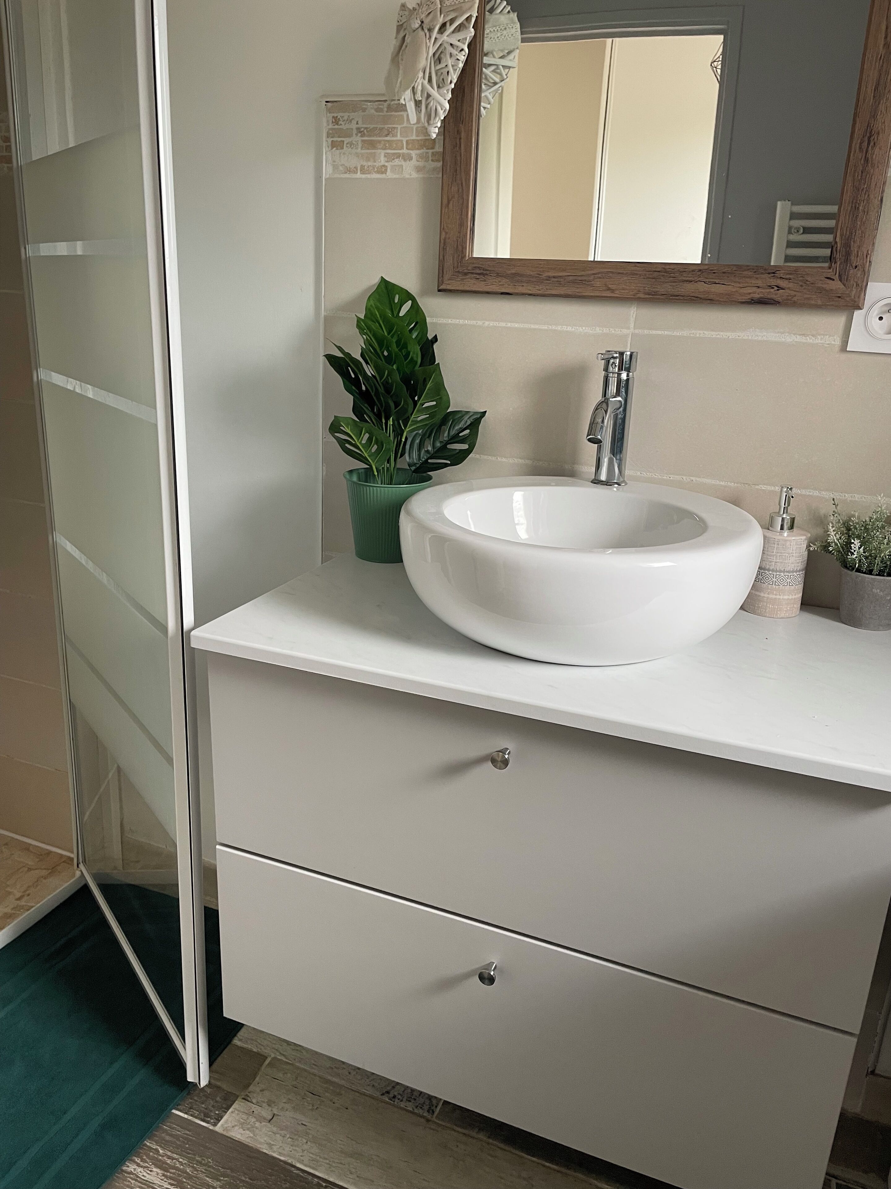 Shower, hair dryer, towels, toilet paper