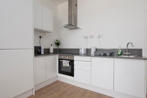 Fridge, microwave, oven, coffee/tea maker