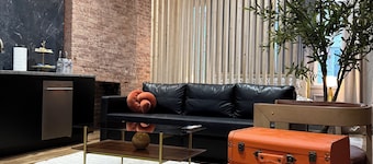 Free parking • KING bed • Stylish Brick Retreat