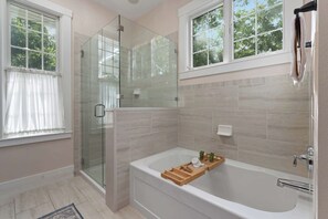 Shower, hair dryer, towels, shampoo