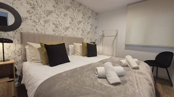 2 slaapkamers, een strijkplank/strijkijzer, gratis wifi, beddengoed