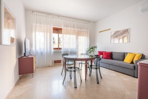 Comfort Apartment, 1 Double Bed with Sofa bed, Balcony, City View | Living area | 30-inch TV with satellite channels