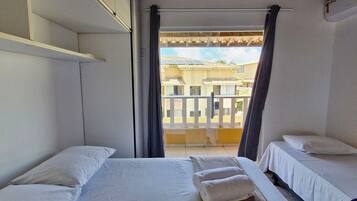 Apartamento básico | Wi-Fi de cortesia, roupa de cama