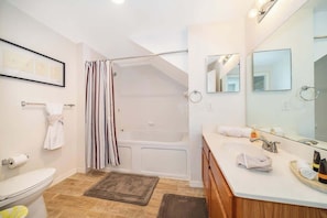 Shower, hair dryer, towels, shampoo