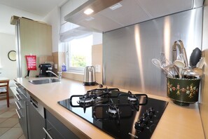 Casa | Cozinha privada | Cadeirão de bebê