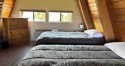 A cozy forest-side chalet with beautiful views of Sedona's red rocks.