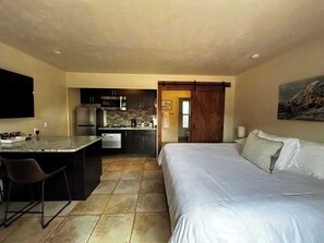 Iron/ironing board, travel crib, free WiFi, bed sheets