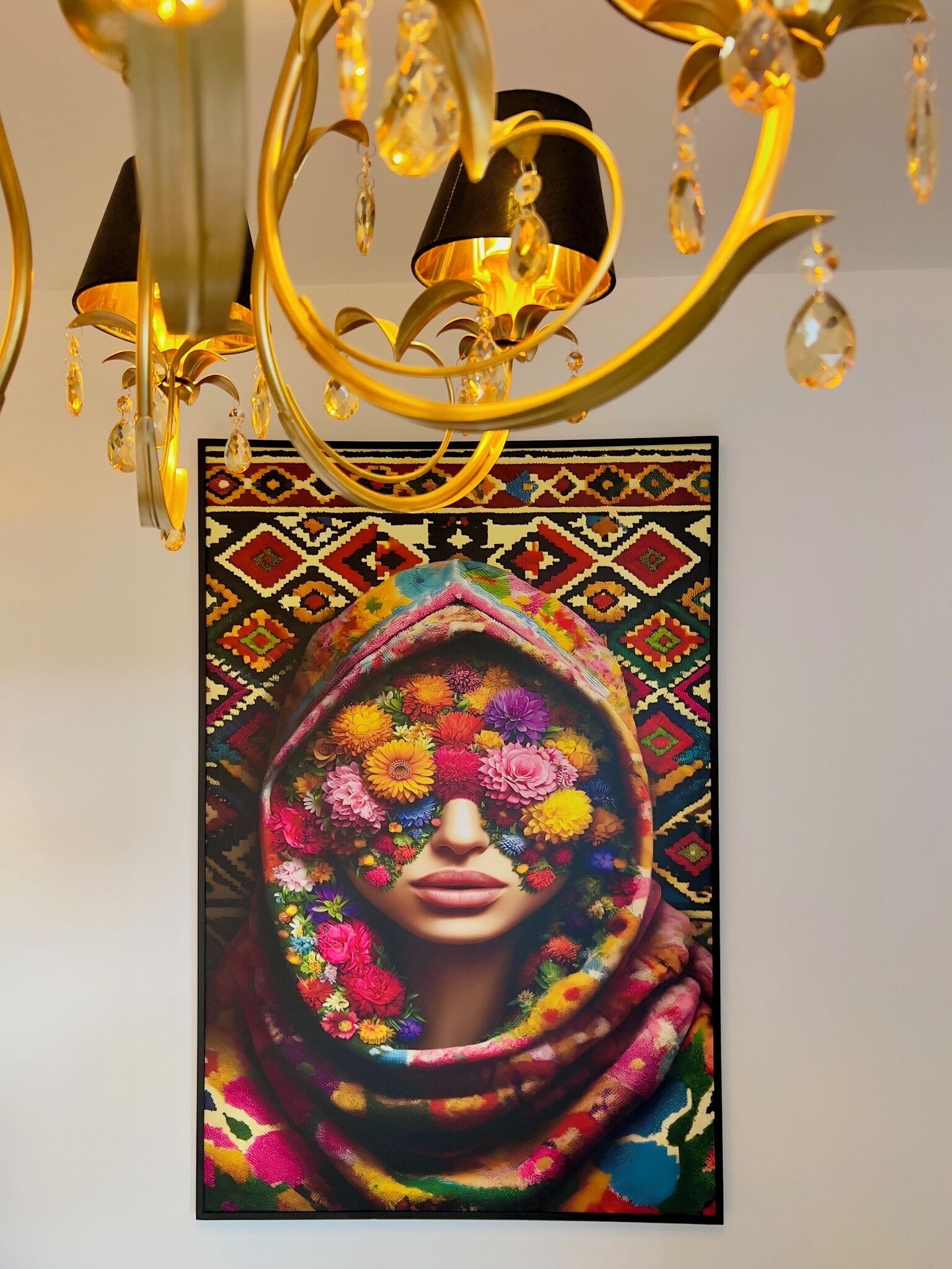 A colorful artwork with a patterned background and a figure draped in a vibrant shawl.