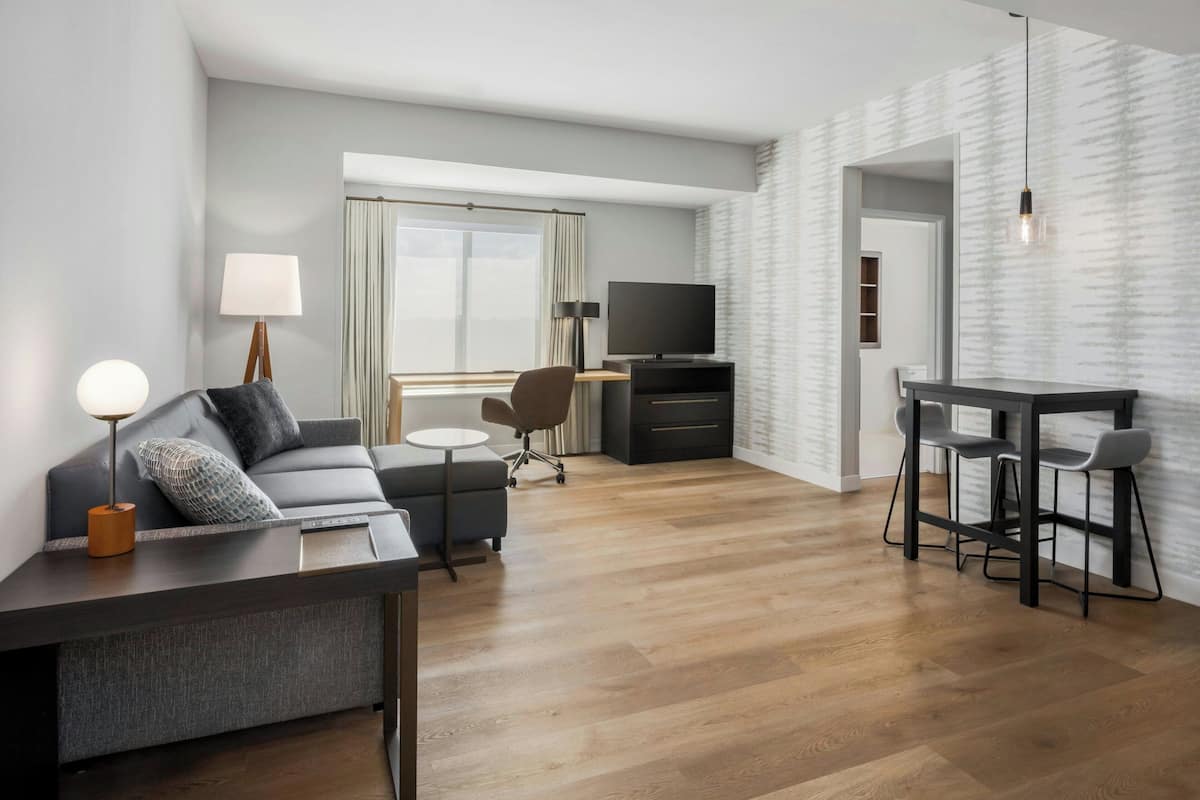 Suite, 1 Bedroom | Living room | 50-inch LCD TV with cable channels, Netflix, streaming services