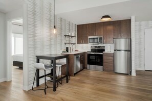 Suite, 1 Bedroom | In-room safe, desk, laptop workspace, blackout drapes