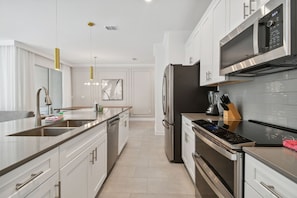 Basic Villa | Private kitchen | Toaster, highchair, blender, waffle maker