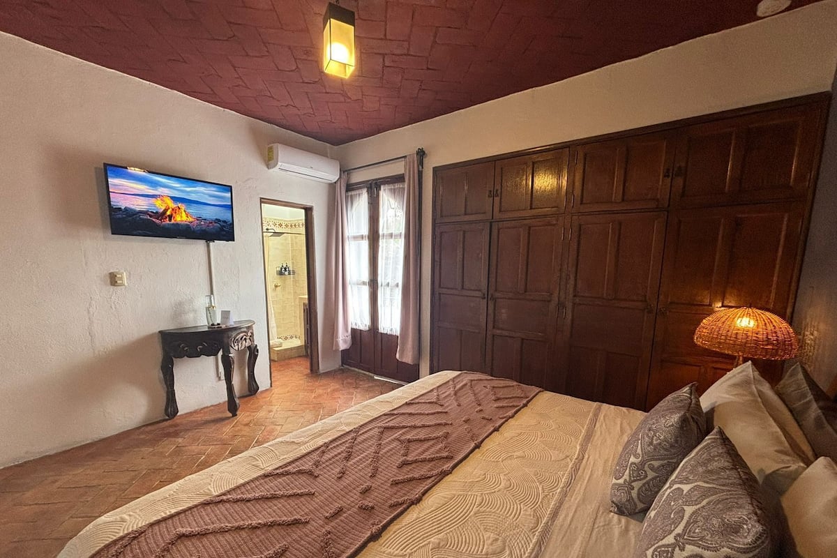 Quarto luxo, sacada, vista para o jardim | Cortinas blackout, ferros/tábuas de passar roupa