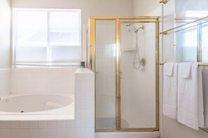 Shower, jetted tub, hair dryer, bidet