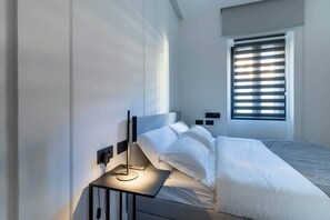 1 chambre, coffres-forts dans les chambres, fer et planche à repasser