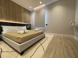 2 bedrooms, in-room safe, iron/ironing board, travel cot