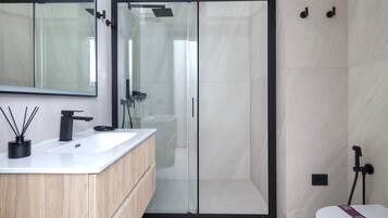 Shower, eco-friendly toiletries, hair dryer, bidet