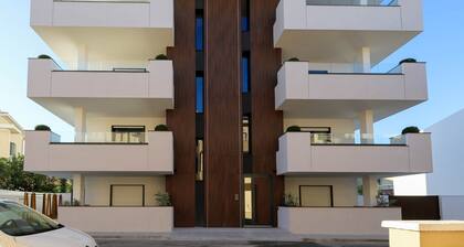 Modern 1BR with Terrace & Parking · Aldo Moro, Olbia · New 2025