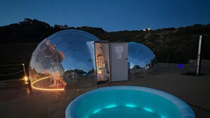 A transparent dome structure with a pool in the foreground. - Palmaria Sky Bubbles Room - Sleep Under the Stars in a Dream Bubble Room (Ponza)