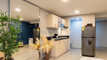 Fridge, microwave, cookware/dishes/utensils