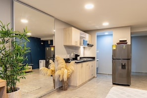 Fridge, microwave, cookware/dishes/utensils