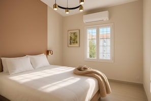 1 bedroom, desk, iron/ironing board, travel cot