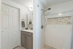 Hair dryer, towels, soap, shampoo