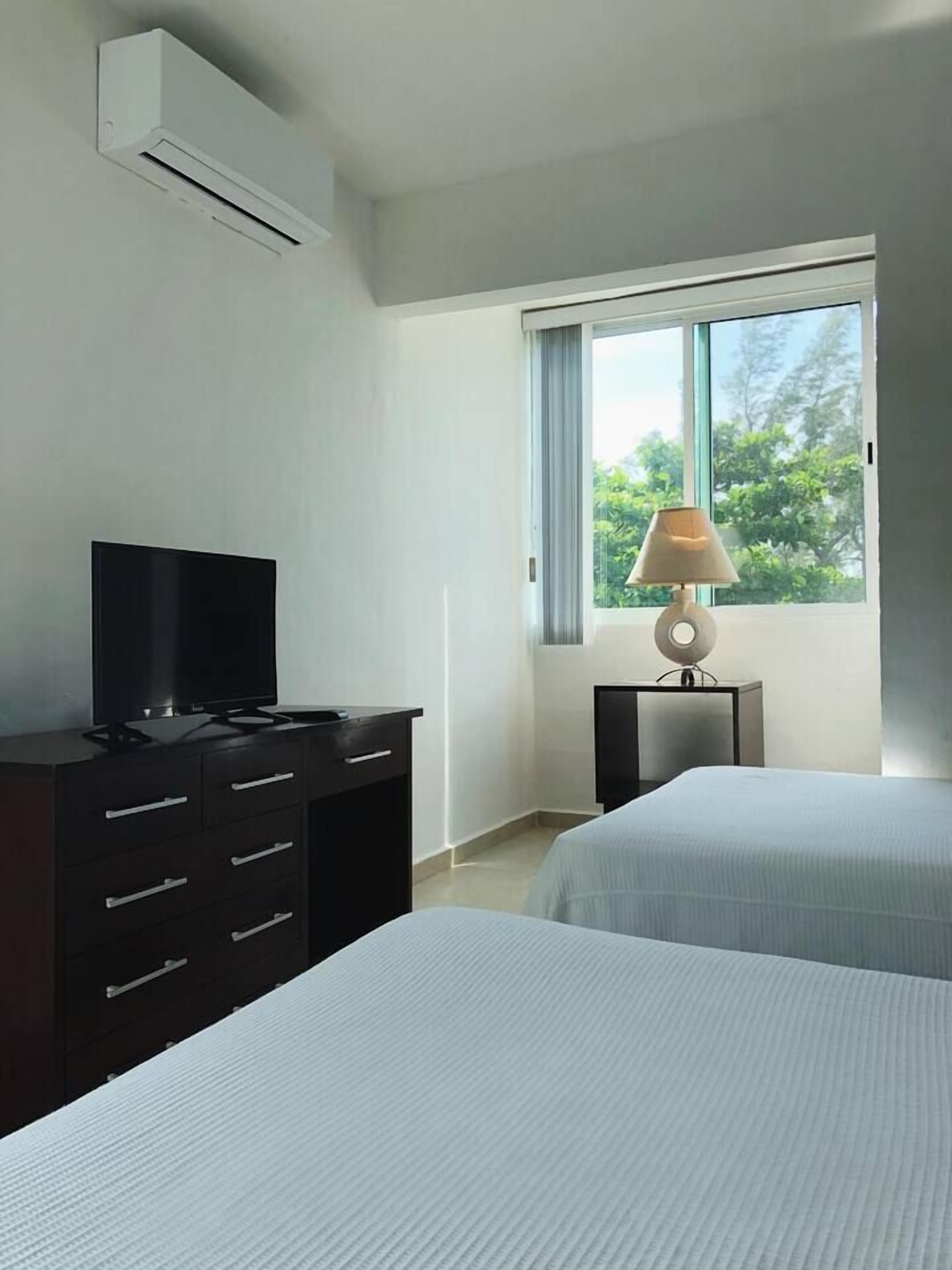 2 quartos, ferros/tábuas de passar roupa, Wi-Fi