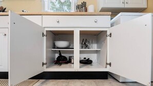 A kitchen with open cabinets revealing cookware and utensils. - Great Space to be Together and Spread out (Hamilton)