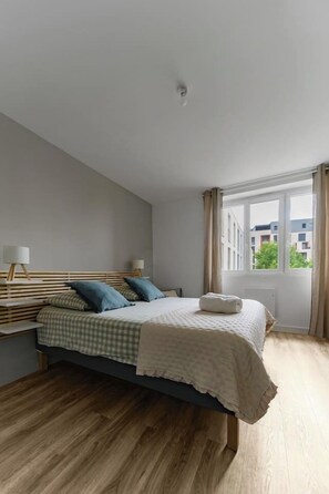 1 bedroom, desk, iron/ironing board, travel cot