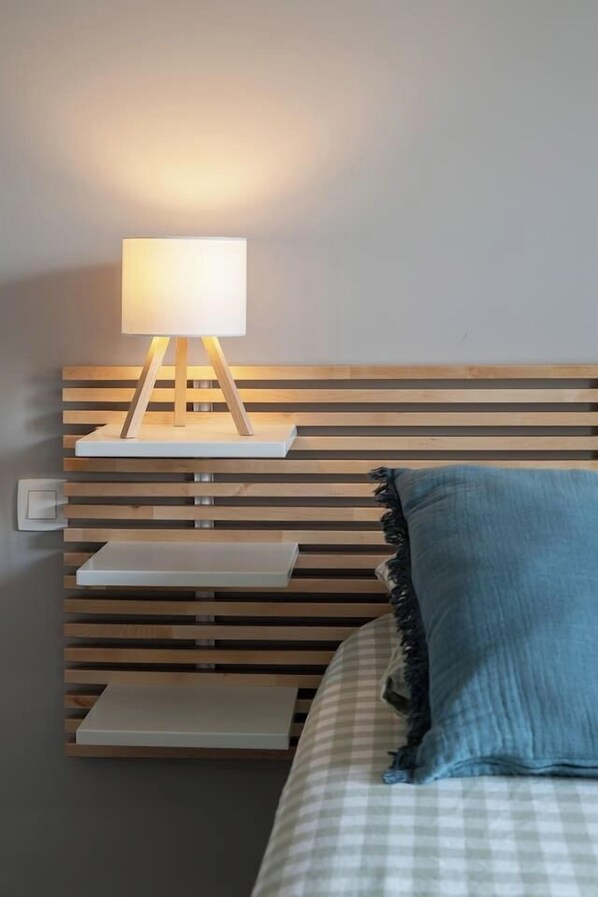 1 bedroom, desk, iron/ironing board, travel crib