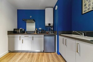 Fridge, microwave, coffee/tea maker, toaster