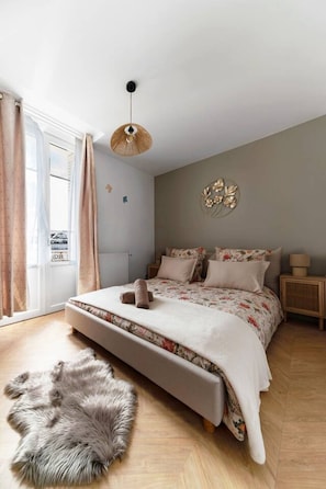 2 chambres, système d’insonorisation, fer et planche à repasser