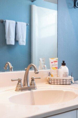 Hair dryer, towels, soap, toilet paper