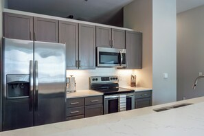 Apartment, 2 Bedrooms | Private kitchen | Full-size fridge, microwave, oven, stovetop
