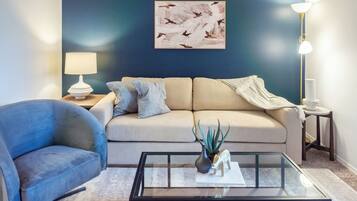 Apartment, 2 Bedrooms | Living area | 50-inch TV with digital channels